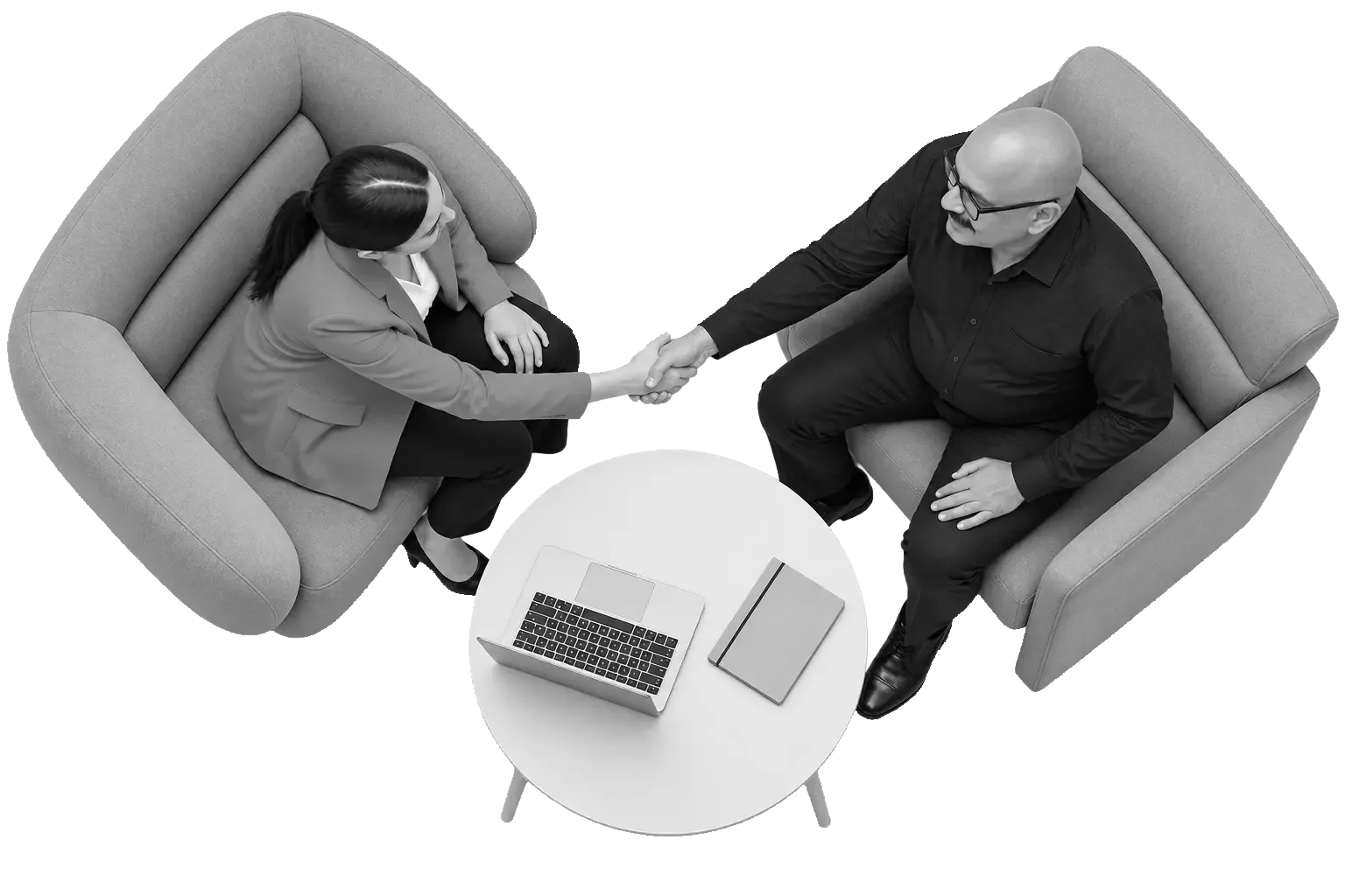 Prasanth Sukumaran shaking hands with a client across a meeting table